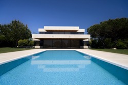 A luxury modern house with a big swimmingpool- Lifestyle concept