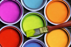 Seven colorful paint with a brush