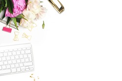 Flat lay. Flower on the table. Keyboard and stapler. Table view. Mock-up background. Peonies