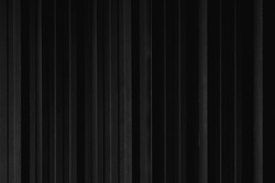 Black strip line metal sheet container wall texture for background.