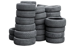 old used car tire stack pile isolated on white background