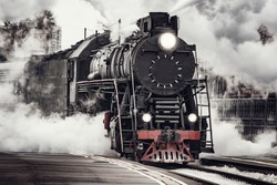 Steam train departs from Riga railway station. Moscow. Russia.