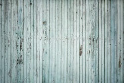 Old blue wooden fence. Wall textured background.