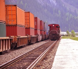 Two freight trains in Canadian rockies. Field station.
