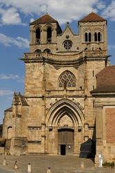 The facade of the Saint Peter and Saint Paul church of the Benedictine priory of Souvigny