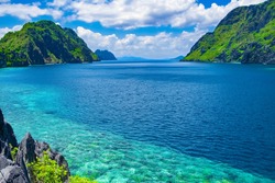 Beautiful tropical sea bay. Scenic landscape with mountain islands and blue lagoon, El Nido, Palawan, Philippines, Southeast Asia. Exotic scenery. Popular landmark, famous destination of Philippines