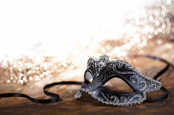 carnival mask with glittering background