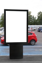 Blank billboard on a parking lot
