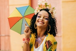Portrait of a Brazilian woman during a carnival block
