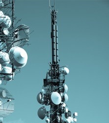 Communication tower radio mast with antenna aerial - cool cyanotype
