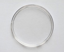 A Petri dish (aka Petrie dish, Petri plate or cell culture dish) cylindrical glass or plastic lidded dish used to culture cells such as bacteria or mosses