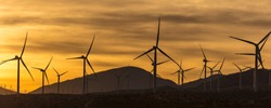 Windmills and windpower at sunset outside of Mojave, California