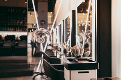 Interior of modern and fashionable hair salon.