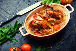 Dietary quail stewed in tomato marinated. Delicious dietary meat. Grilled chicken