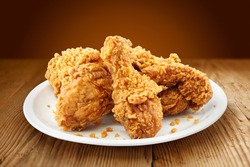 crispy kentucky fried chicken in a wooden table