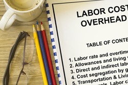 Labor Costs - 7 Best Ways To Manage The Labor Costs for a Restaurant 1 Labor cost and overhead cost- concept for labor cost rates and expenditures.