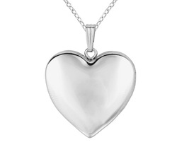 Silver pendant in shape of heart on chain isolated on white