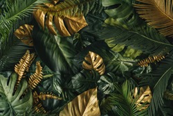 Creative nature background. Gold and green tropical palm leaves. Minimal summer abstract jungle or forest pattern.