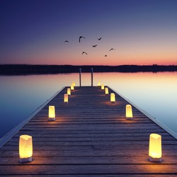 magical place at the lake, romantic evening on wooden jetty at the beach