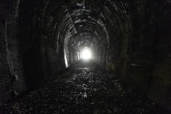 Spooky dark old railway tunnel, abandoned construction near Osaka, Kansai, Japan