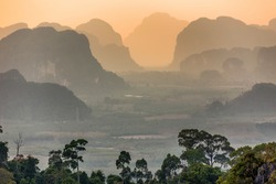 Viewpoint from the tiger temple ( Wat Tham Suea) on mountains at dusk in the Krabi province, Thailand