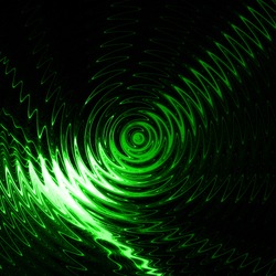 Abstract green light ripple in water with concentric circles