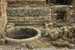 Ancient well. Roman ruins of Caparra. Extremadura. Spain.