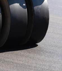 big black tyres on the asphalt