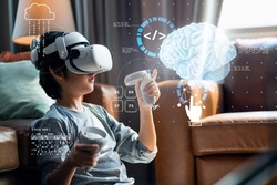 Asian Little boy with VR glasses studying Human body path simulation sciences at home,curious student wears a virtual reality headset to study science home online study futuristic lifestyle learning