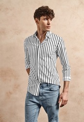 Hansome man wear striped cotton shirt in black and white 