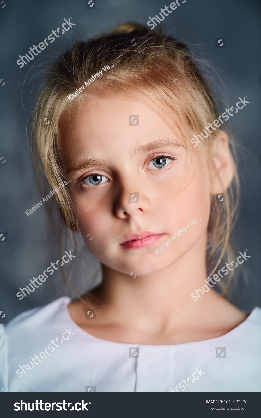 portrait-beautiful-eight-year-old-girl-stock-photo-1011982336