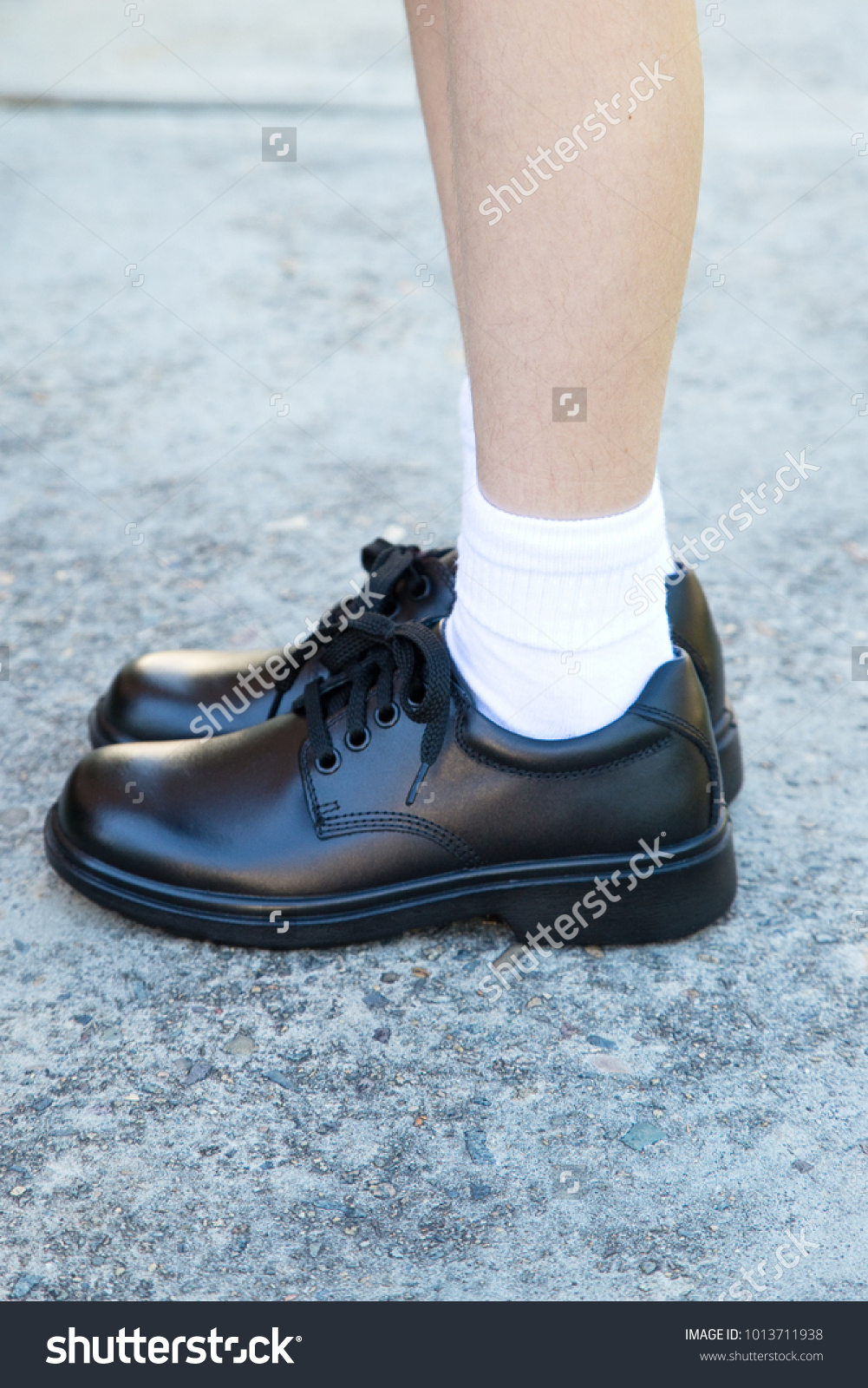 black and white uniform shoes