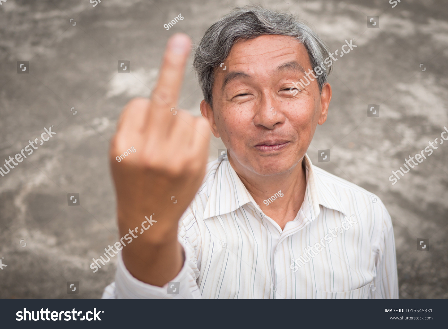 stock-photo-senior-old-man-flipping-middle-finger-rude-hand-sign-gesture-1015545331.jpg