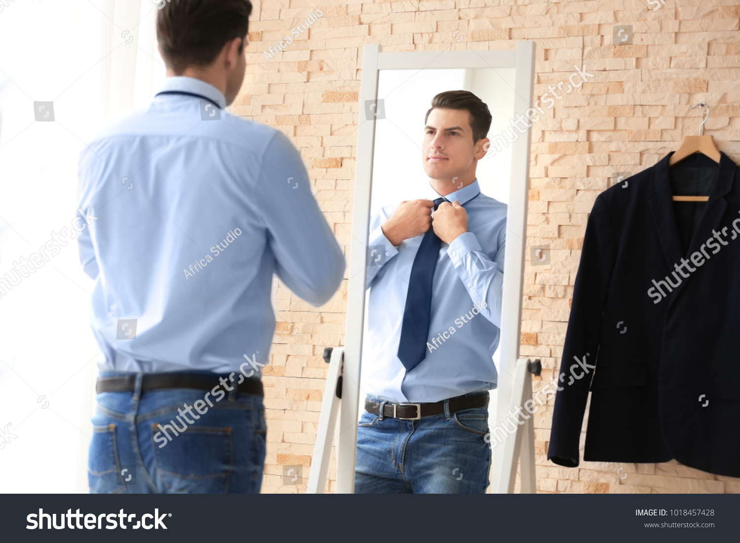 Young Businessman Looking Himself Mirror Indoors Stock Photo 1018457428 ...