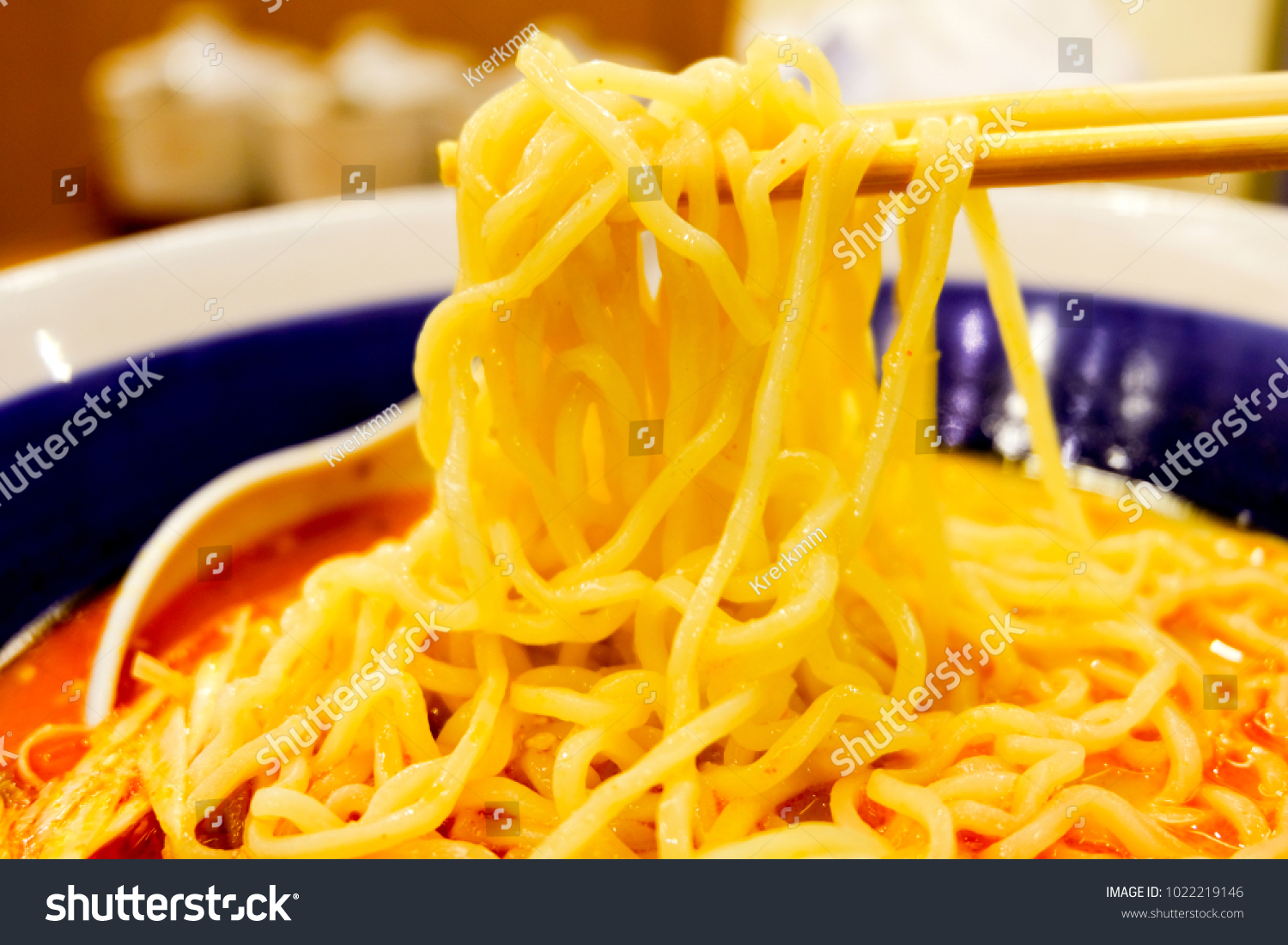 person-eating-ramen-lunch-time-japanese-stock-photo-1022219146