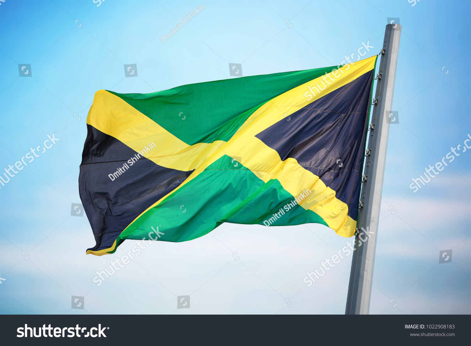 Flag Jamaica Flying Against Blue Sky Stock Photo 1022908183 | Shutterstock