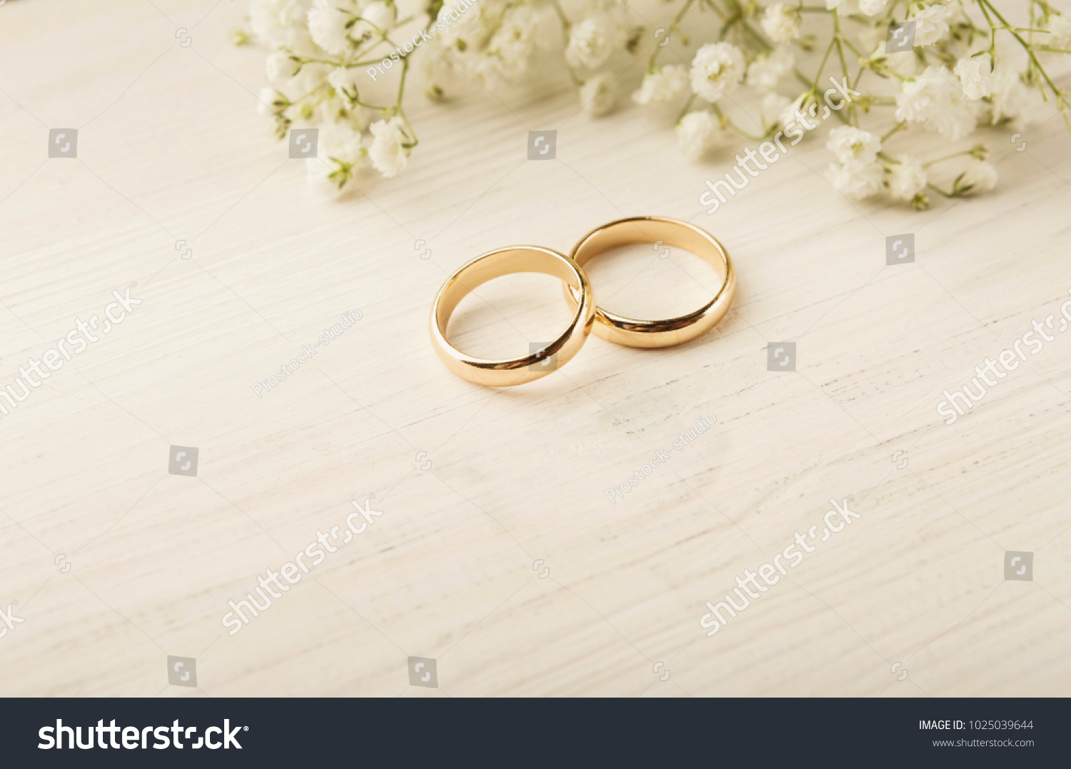 Two Golden Wedding Rings White Flower Stock Photo 1025039644 | Shutterstock