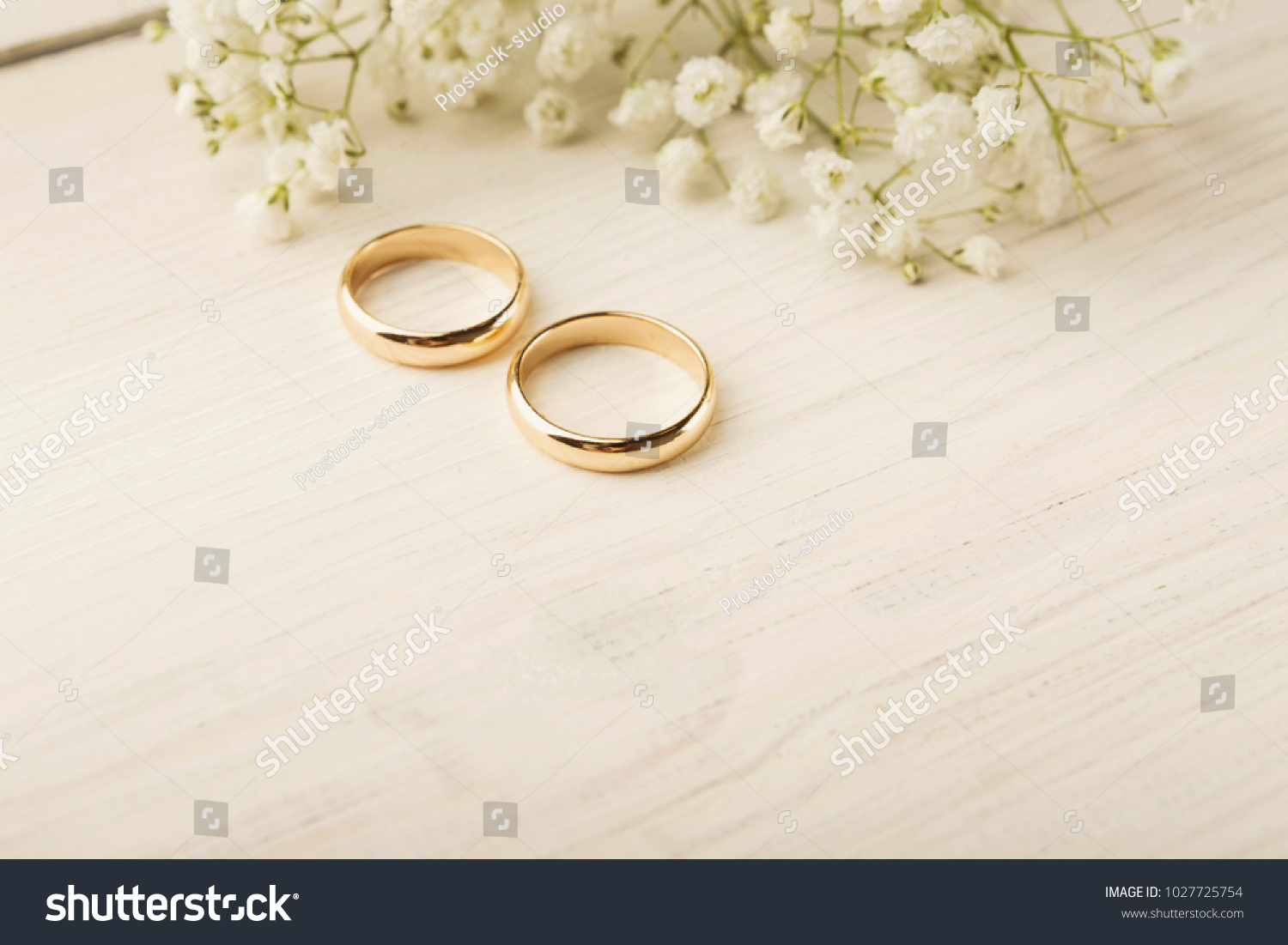 Two Golden Wedding Rings White Flower Stock Photo 1027725754 | Shutterstock