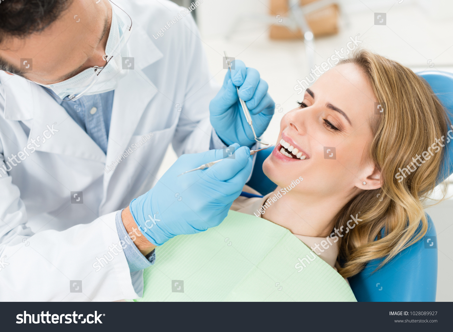 Doctor Treats Patient Teeth Modern Dental Stock Photo 1028089927 ...