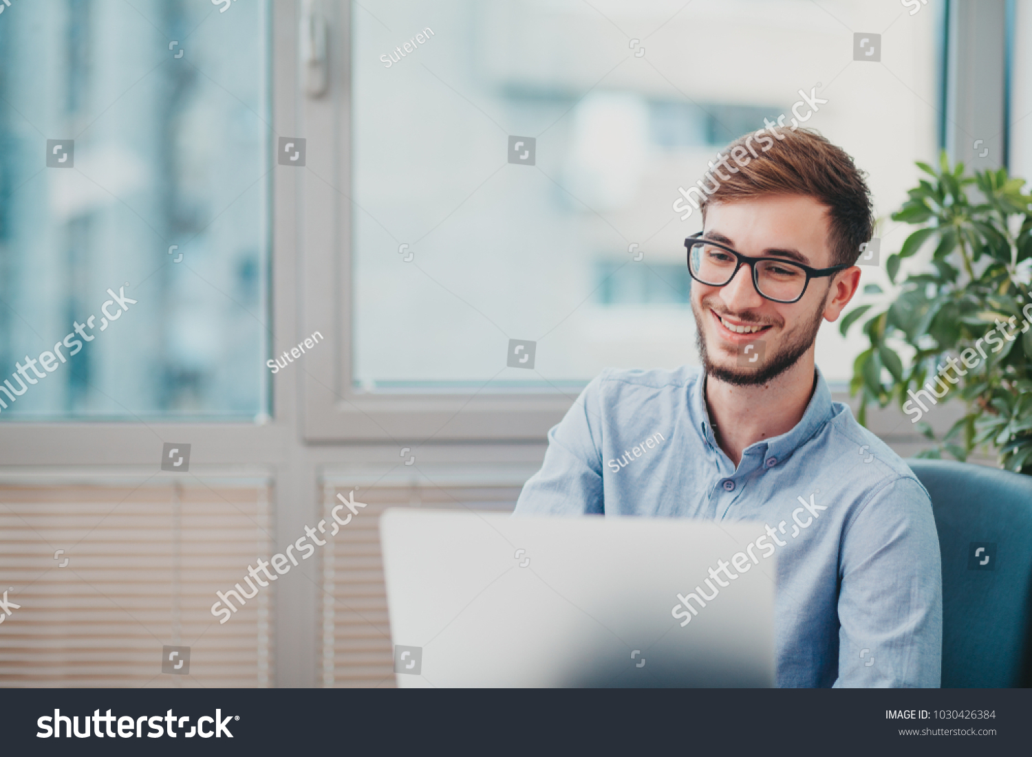 Young Intern Working Office Stock Photo 1030426384 | Shutterstock