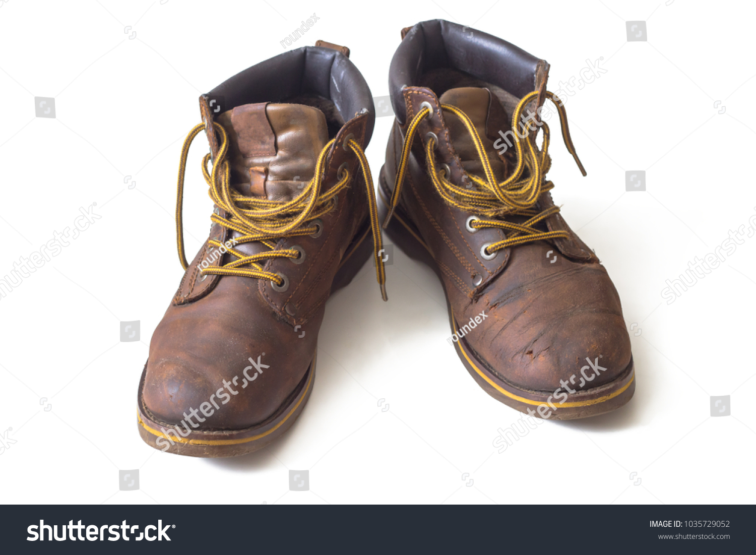 brown boots yellow laces