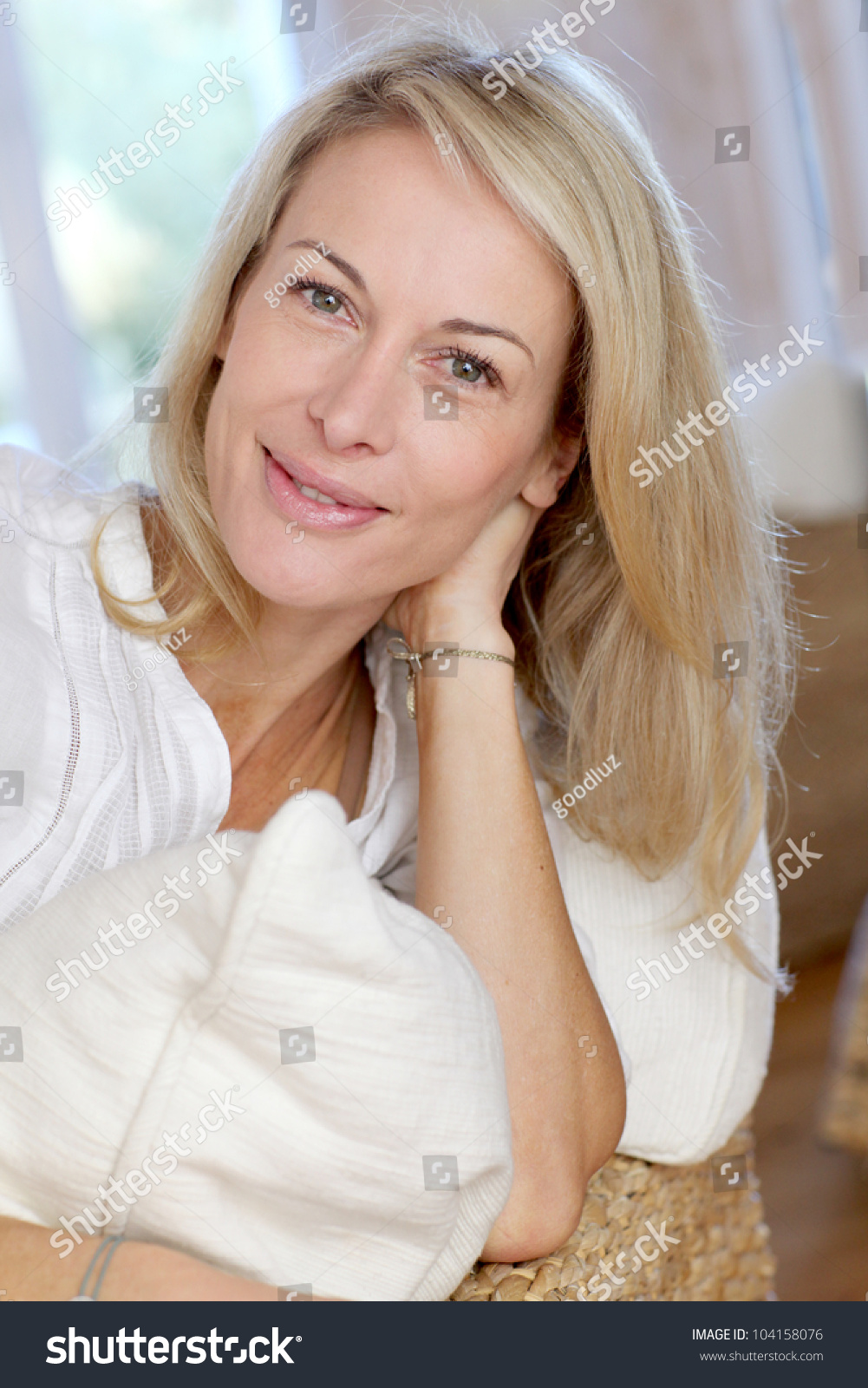 Portrait Blond Mature Woman Relaxing Sofa Stock Photo