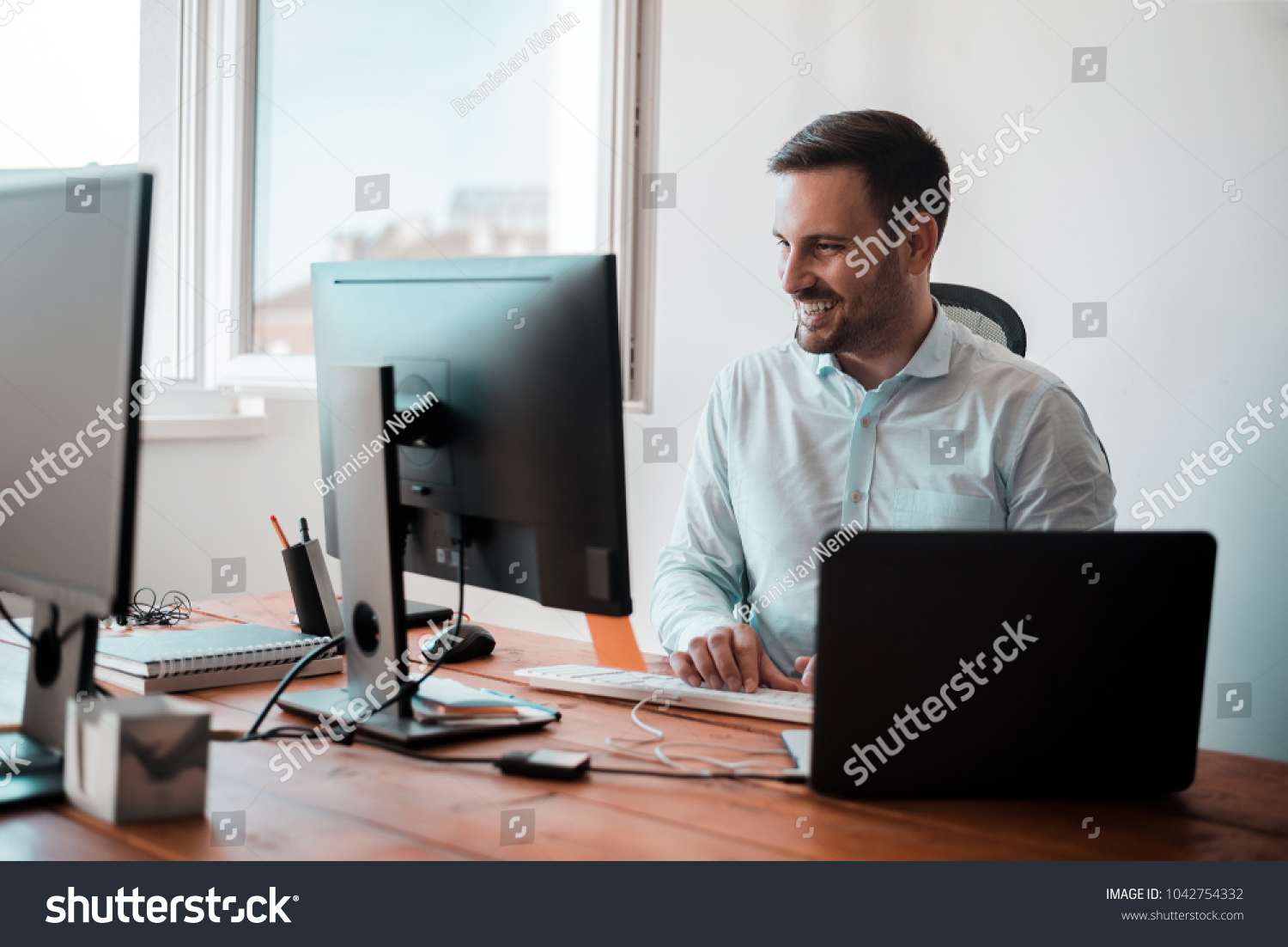 Smiling Handsome Man Working Coworking Office Stock Photo 1042754332 ...