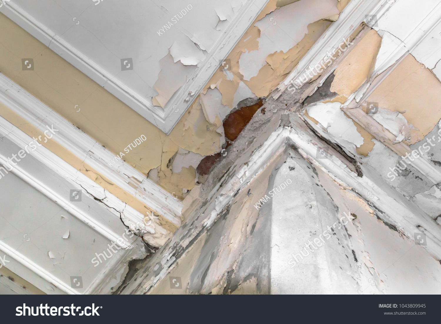 Peeling Paint On Interior Ceiling Result Stock Photo 1043809945   Stock Photo Peeling Paint On An Interior Ceiling A Result Of Humidity 1043809945 