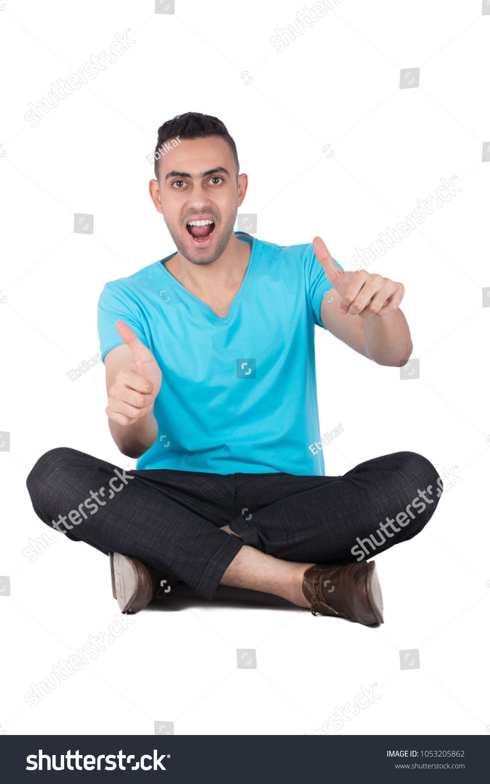 Young Man Sitting On Floor Crossed Stock Photo 1053205862 | Shutterstock