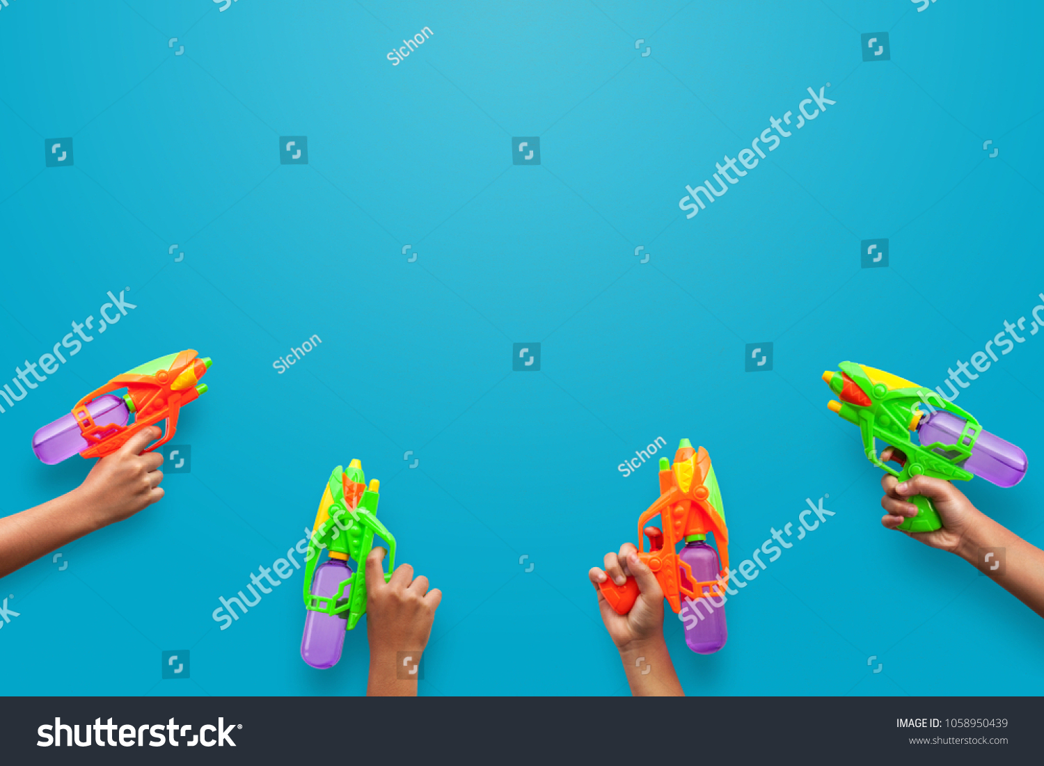 Hands Holding Plastic Water Gun On Stock Photo 1058950439 | Shutterstock