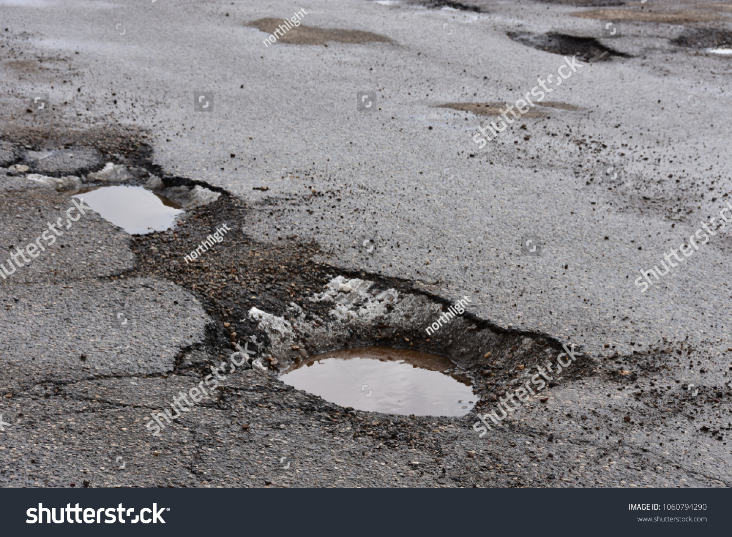 Potholes Parking Creating Driving Hazards Stock Photo 1060794290 ...