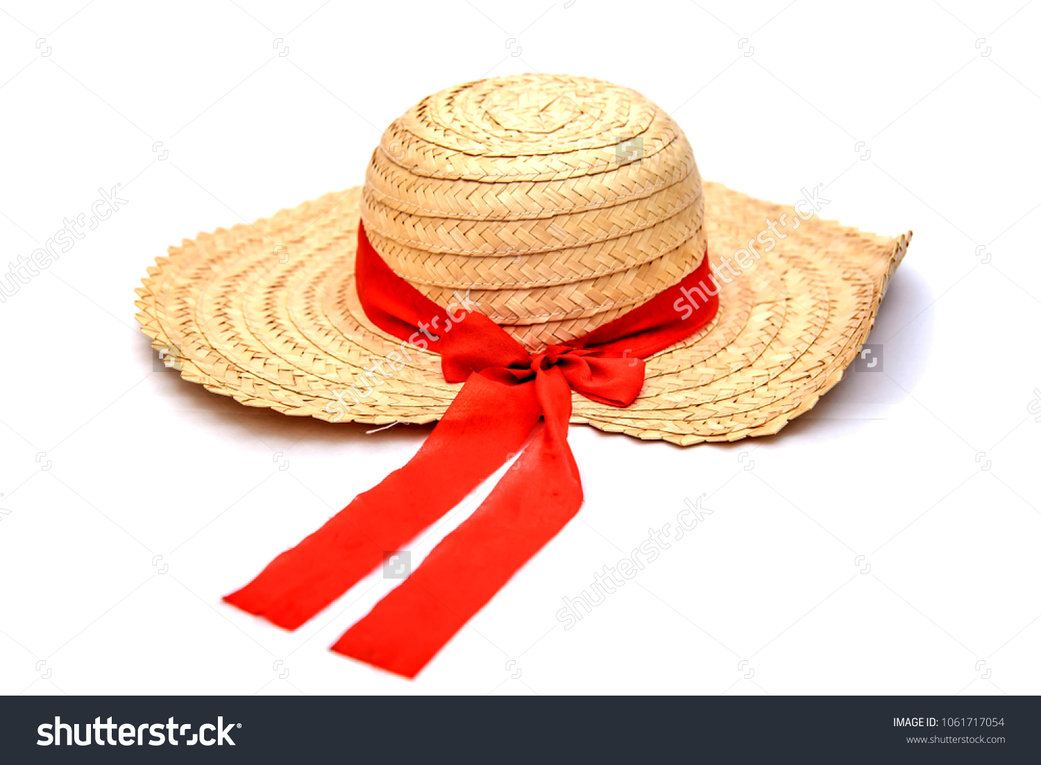 straw hat with red ribbon