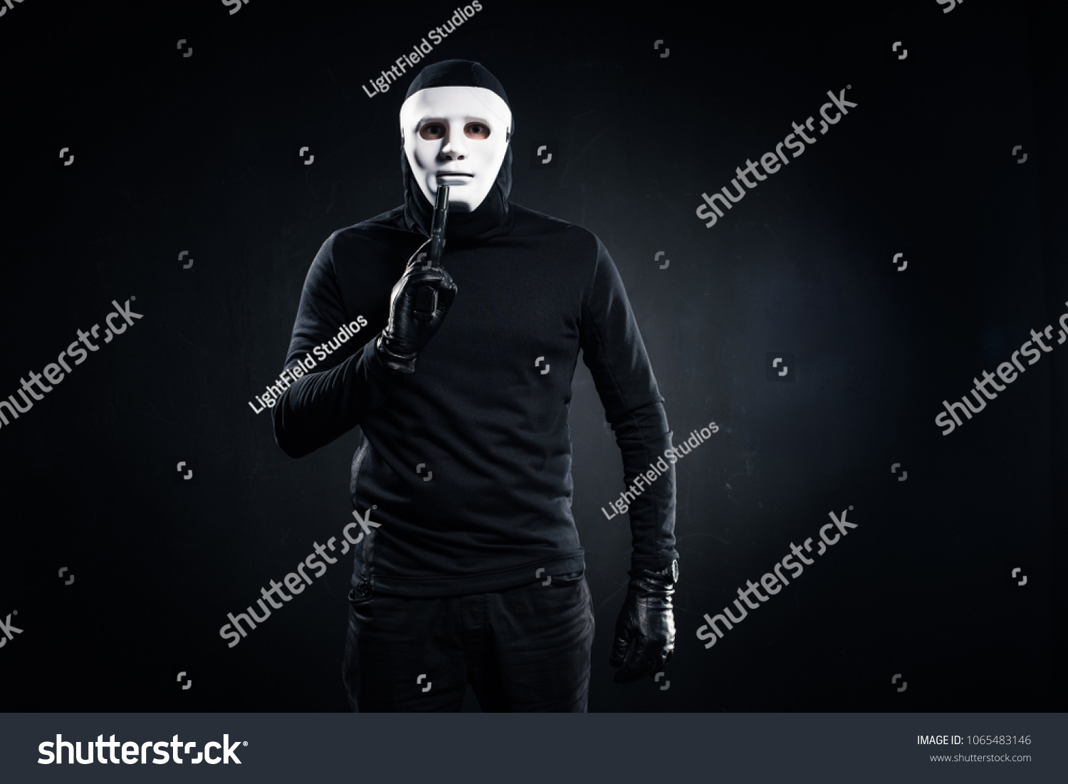 Robber Mask Balaclava Holding Gun Stock Photo 1065483146 | Shutterstock