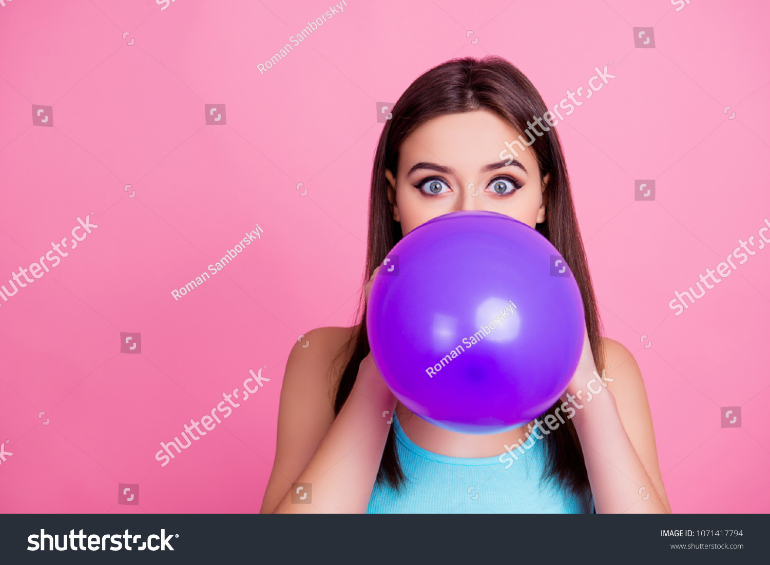 Girl Blowing Balloons